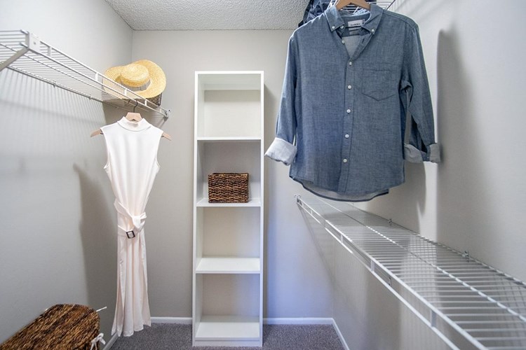Spacious walk-in closets with built-in organizers are featured in the master bedrooms.