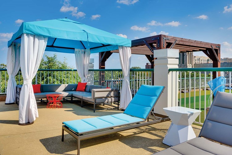 Relax and hang out in one of the pool cabanas