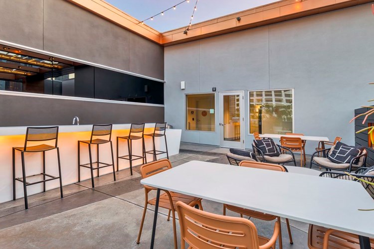 Rooftop with kitchenette and lounge seating