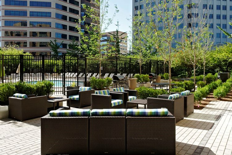 Courtyard with barbecue grills and lounge seating
