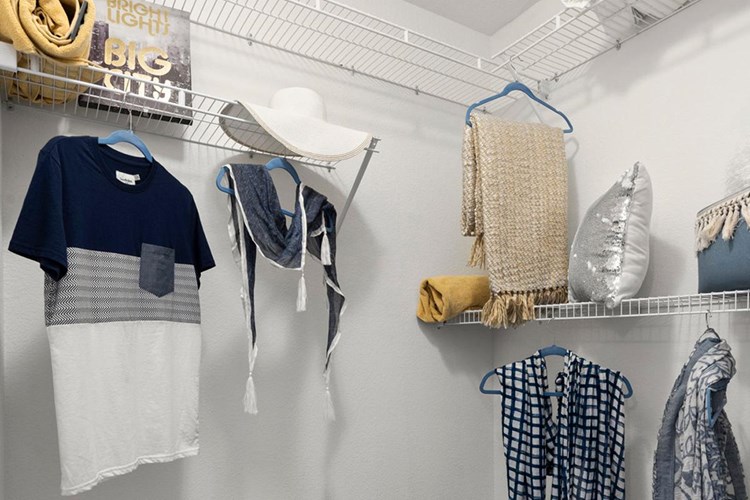 Spacious walk-closets with built-in organizers.