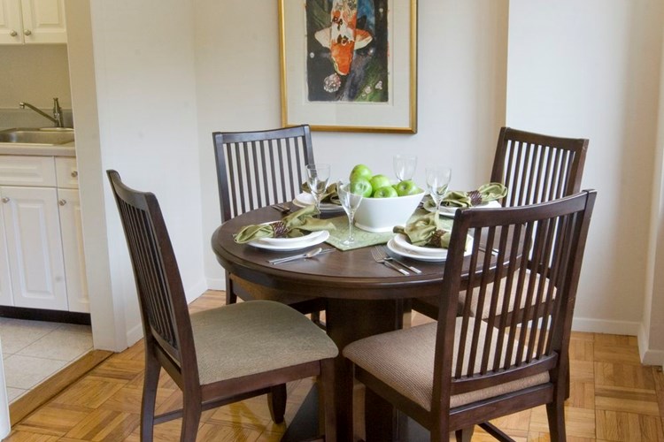 Dining area with parquet flooring