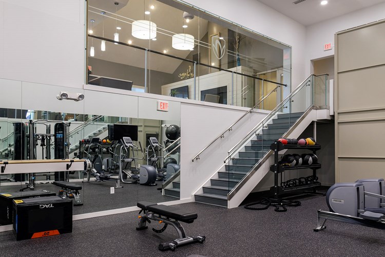 Fitness center comes equipped with both cardio and weight training equipment