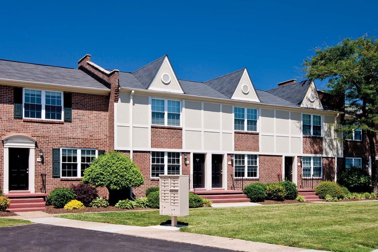Townhome-style apartments in a wooded neighborhood