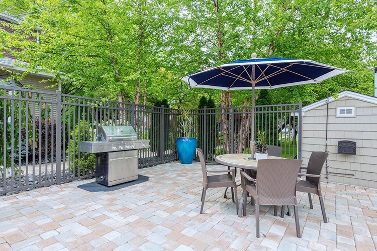 Our stainless-steel grill is perfect for a BBQ by the pool.