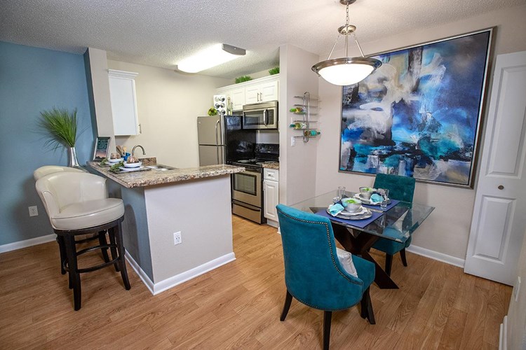 All floor plans feature a separate dining area that overlooks the kitchen.