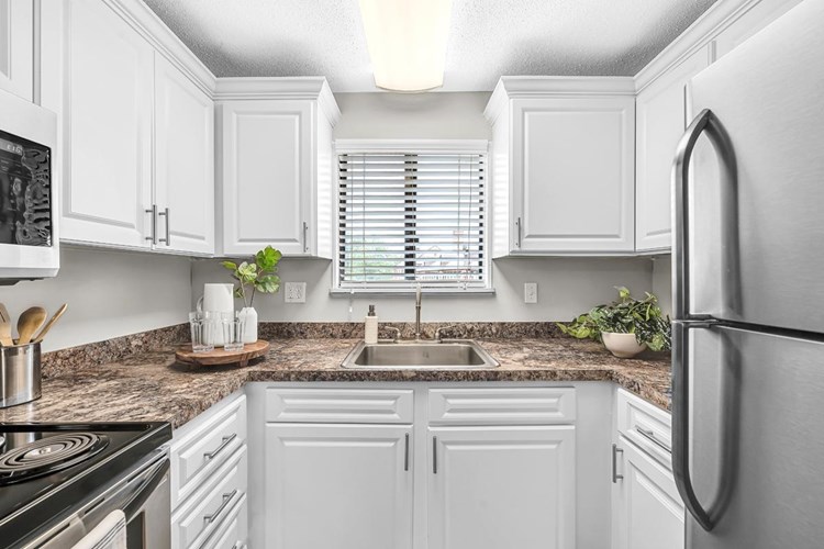 You'll enjoy our newly updated kitchens featuring a built-in pantry area and a dishwasher.