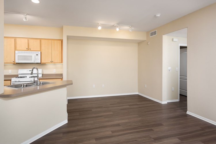 Finish Package I kitchen and dining area with hard surface flooring (select homes)