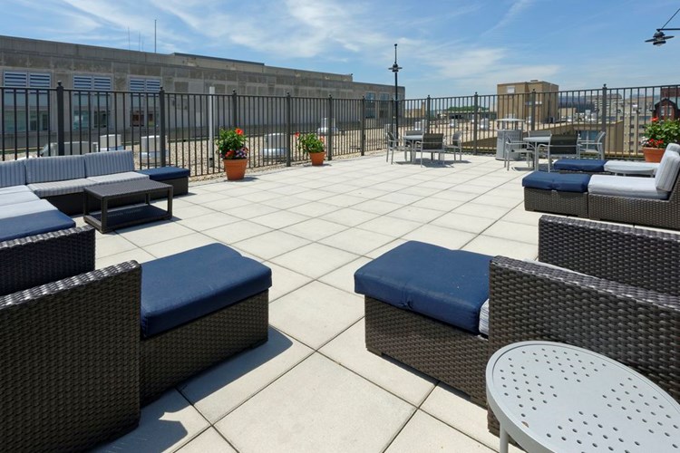 Rooftop lounge chairs and seating area, facing towards E and 21st Streets