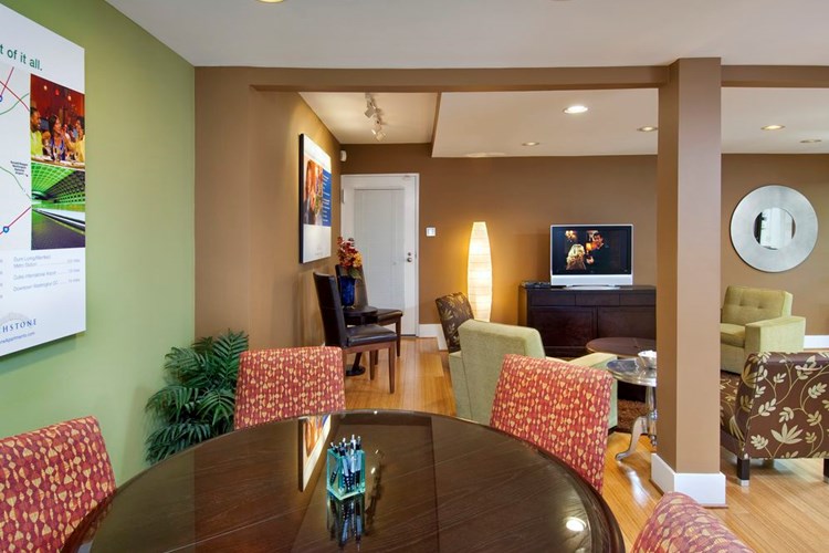 Resident lounge with seating and flat screen television