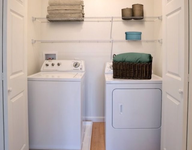 Two Bedroom Townhome (BT3) Laundry Room with Full-Size Washer/Dryer