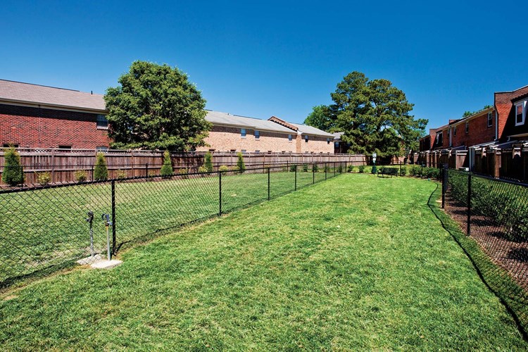 Spend time outdoors at our fenced-in dog park