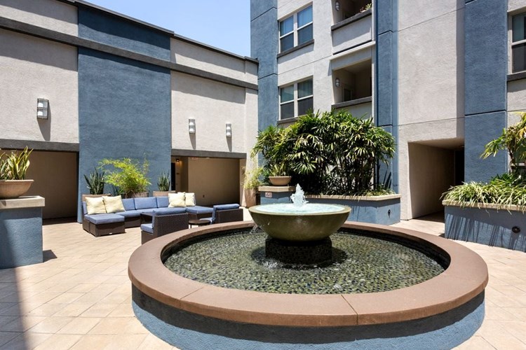 Courtyard with fountain and soft lounge seating