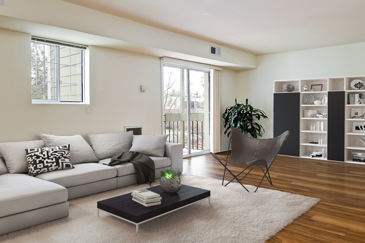 Spacious living room with vinyl wood flooring