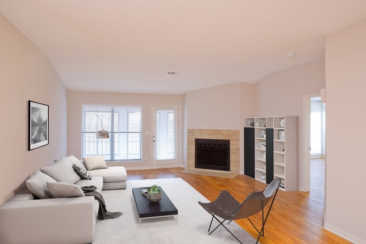 Spacious living room with wood flooring throughout