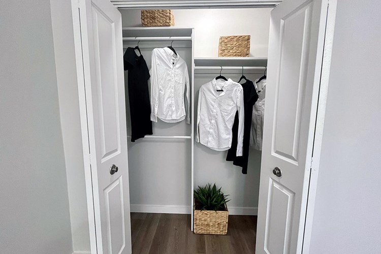 Bedrooms feature spacious closets with built-in organizers.