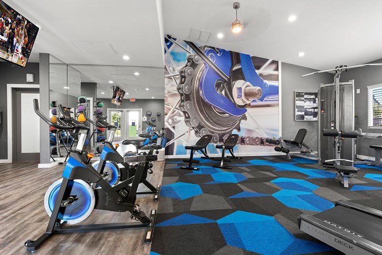 Our fitness center also features spinning bikes .