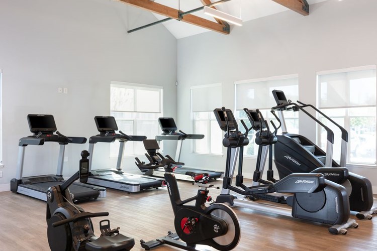 State-of-the-art fitness center with cardio equipment