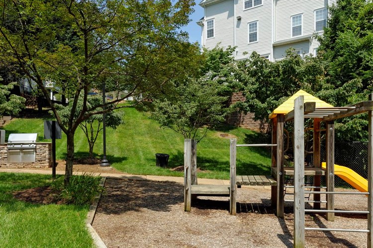 Courtyard greenspace with playground and pathway