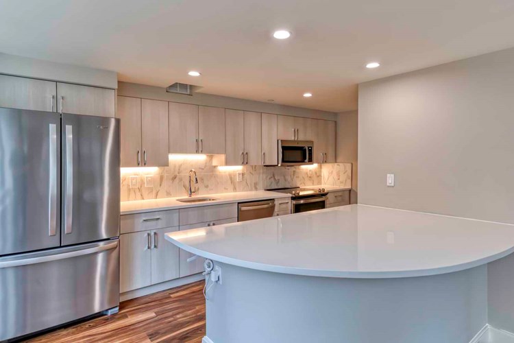 Select homes feature upgraded kitchens with quartz countertops
