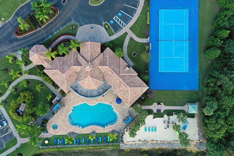Enjoy all of our resort-style amenities including a pool, private beach area with firepit, and a tennis court.