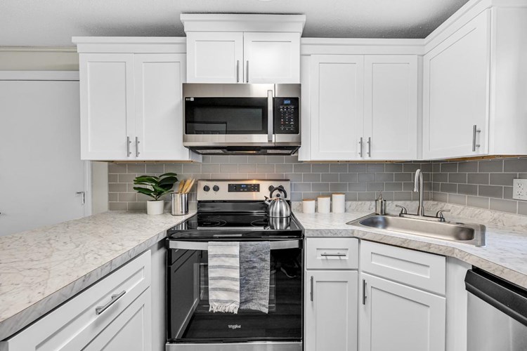 All kitchens feature stainless steel appliances.