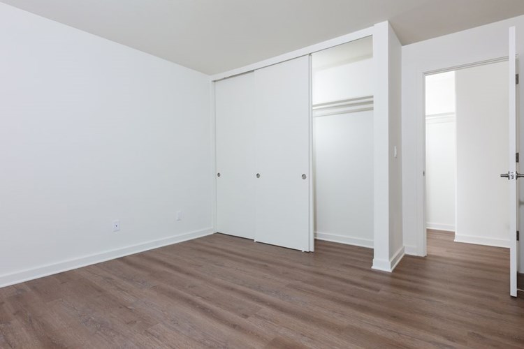 Bedroom with hard surface flooring
