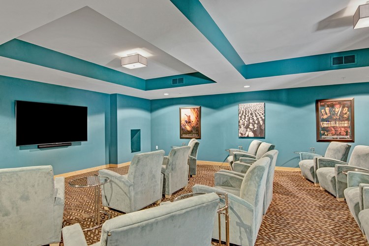 Covington Media Room With TV and Lounge Chairs