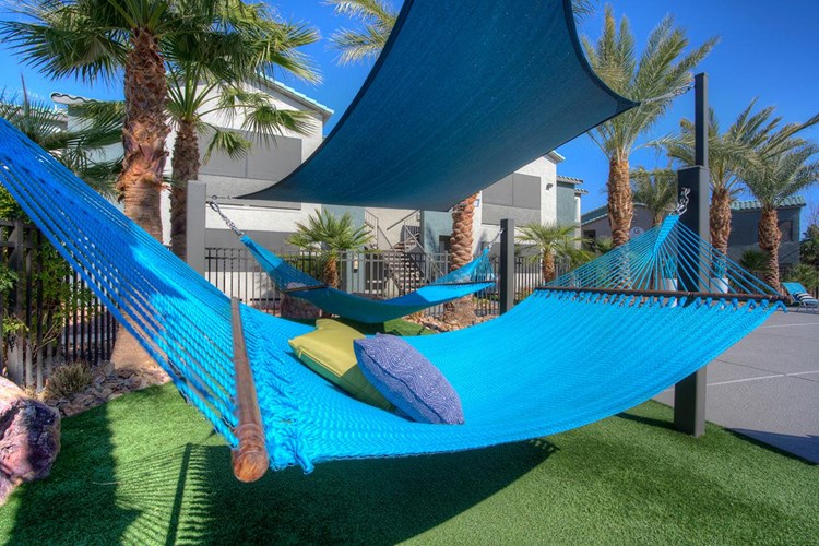 Lay out and relax in one of our hammocks by the pool.