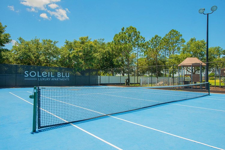 Play a game on our tennis court.