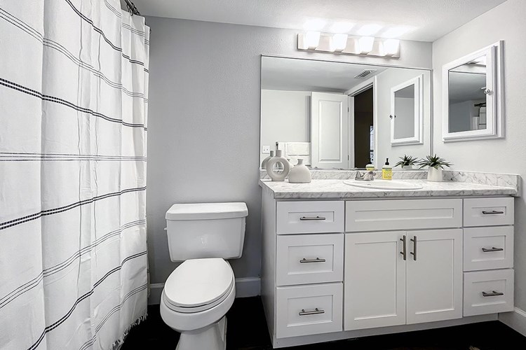 Bathrooms feature new cabinetry, flooring and modern counters.