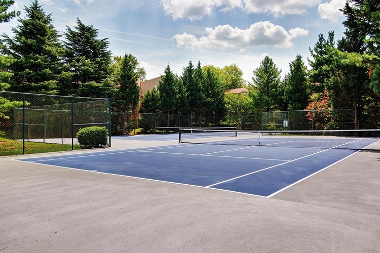 One of six tennis courts on-site