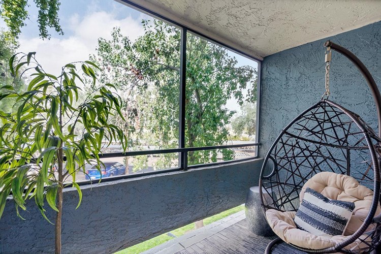 Enjoy the outdoors in your private screened-in patio attached to the master bedroom.