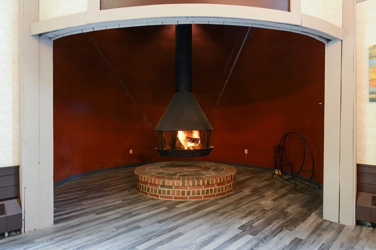 Clubhouse features a fireplace perfect for social gatherings