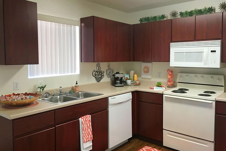 Spacious, open kitchens with ample cabinet space.