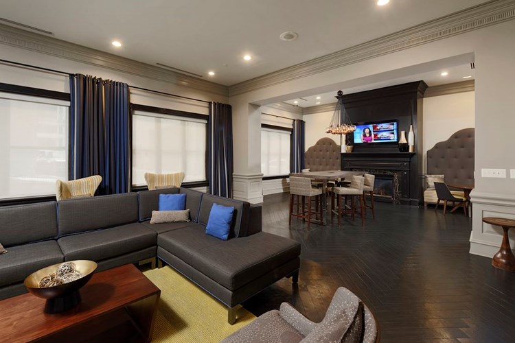Resident lounge with flat screen television and seating