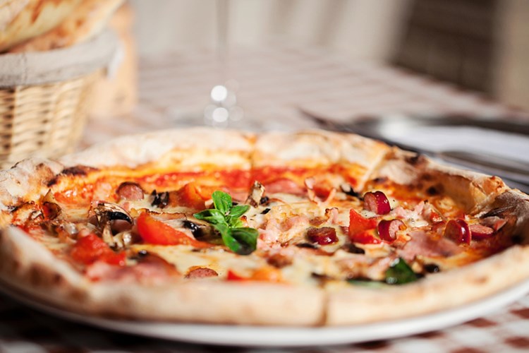 Trendy restaurants, including Varasano's Pizzeria, are located nearby