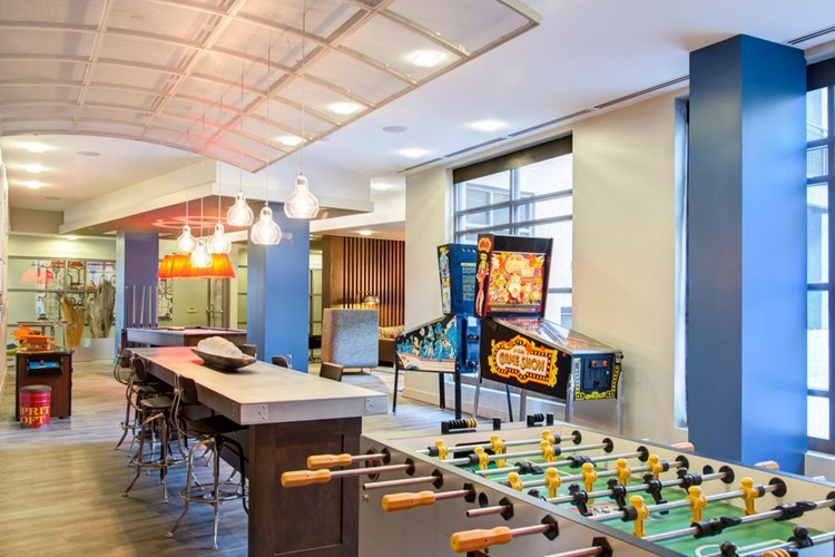 Resident lounge with arcade games, foosball and billiards