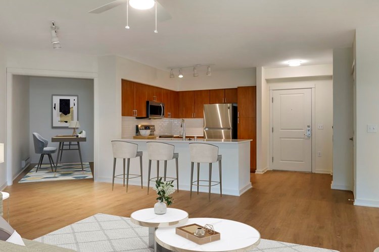 Newly renovated Finish Package II apartment homes feature an open concept with hard surface flooring