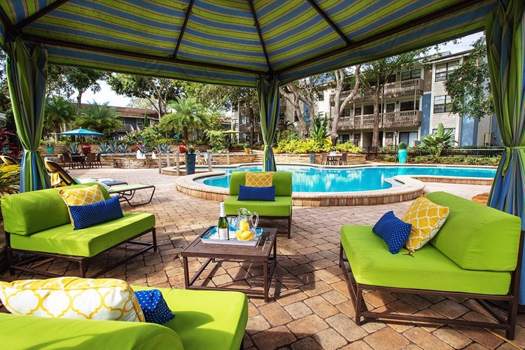 Relax next to the pool under the shade of our poolside cabana.
