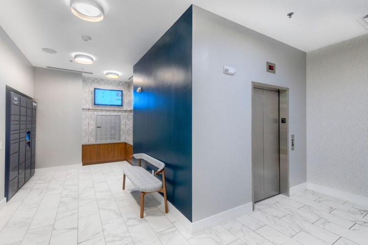 2700 building lobby with Amazon HUB package locker system