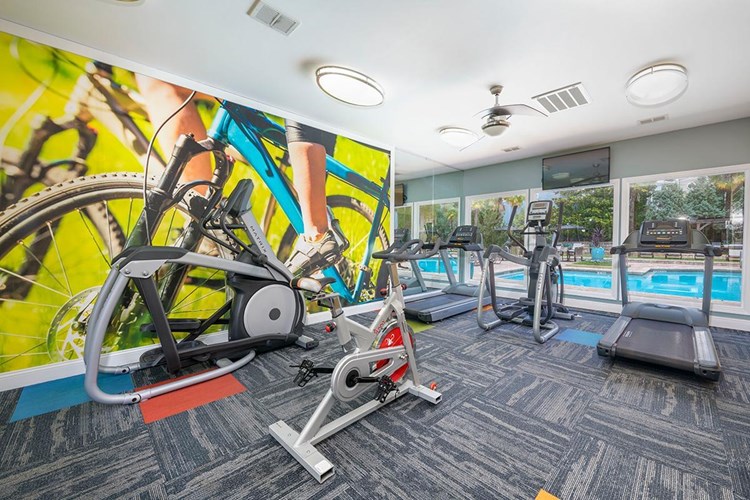 24-hour fully equipped fitness center overlooking the swimming pool.