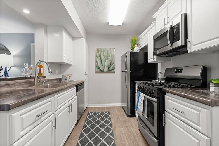 You’ll definitely be the envy of friends and family-alike with this remodeled, chef-style kitchen!