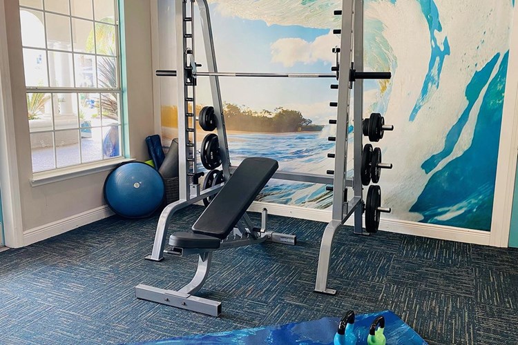 Our fitness center features plenty of weight training equipment for that full body workout.