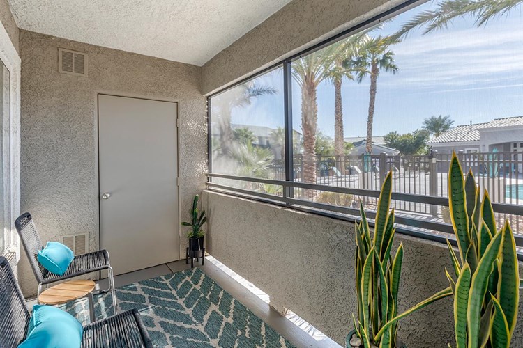 Enjoy some fresh air from your very own private, screened-In patio. 