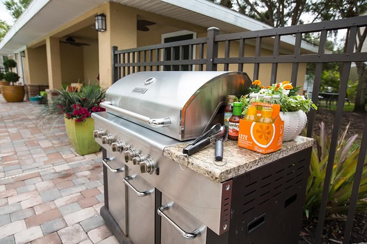 Have a cookout with some friends next to the pool with our gas grill.