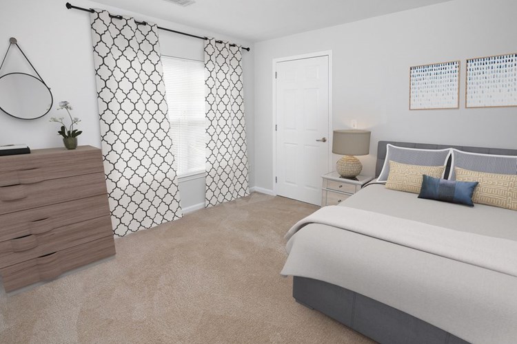 Bedroom with carpeted flooring