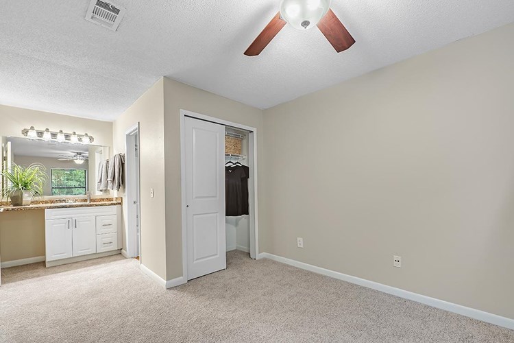 Master bedrooms feature spacious closets, a multi-speed ceiling fan, and an ensuite bathroom.