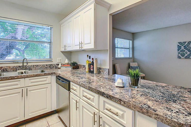 Kitchens are fully applianced including a dishwasher and breakfast bar!