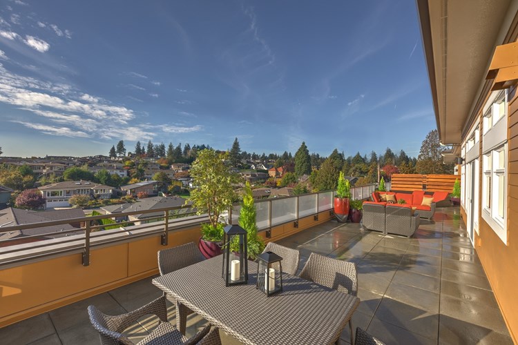 Create your own outdoor oasis with beautiful views and room enough for outdoor dining and seating on our extra-large private balcony/deck space in select homes